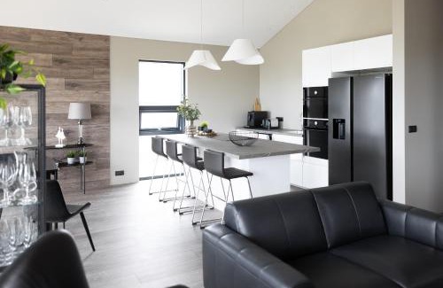 Vestmannaeyjar Villa | Exquisite Ocean Villas: 4-Star Getaway with Hot Tub