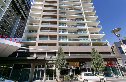 Adelaide Central Business District Apartment | Elegant Stay Overlooking Hindmarsh Sq with Pool & Gym