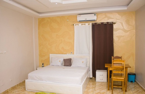 Lome Hotel | Elegant Palace with Pool & Family-Friendly Amenities