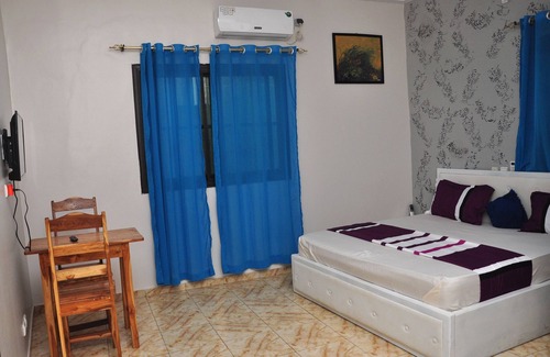 Lome Hotel | Elegant Palace with Pool & Family-Friendly Amenities