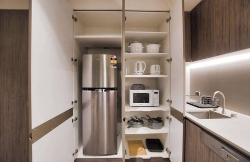 Adelaide Central Business District Apartment | Discover Your Parisian Escape with Pool, Spa & Gym
