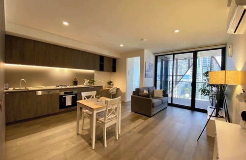 Adelaide Central Business District Apartment | Discover Your Parisian Escape with Pool, Spa & Gym