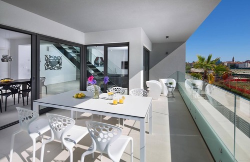 Fazana Apartment | Prime Penthouse with Jacuzzi Steps from the Beach