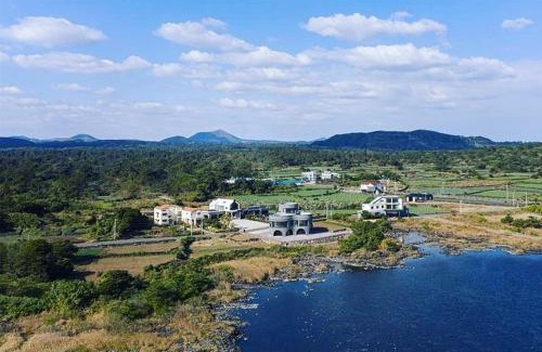 Seongsan House | Indulge in Villecot's Pool Villa with Oceanfront Views
