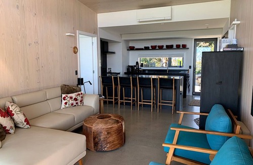 Langs Beach House | Pet-Friendly Retreat with Ocean Views and Spa Amenities