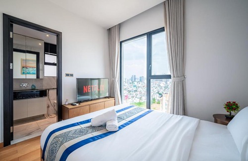 District 1 Apartment | Indulge at D1mension: 4-Star Retreat with Hot Tub & More
