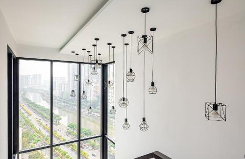 District 1 Apartment | Indulge at D1mension: 4-Star Retreat with Hot Tub & More