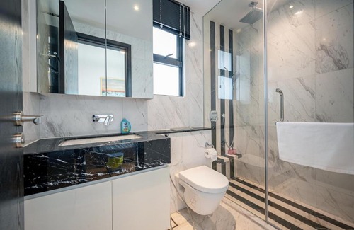 District 1 Apartment | Indulge at D1mension: 4-Star Retreat with Hot Tub & More