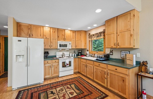 Rustic Cabin | Riverfront Cabin Retreat with Hot Tub & Top Guest Rating