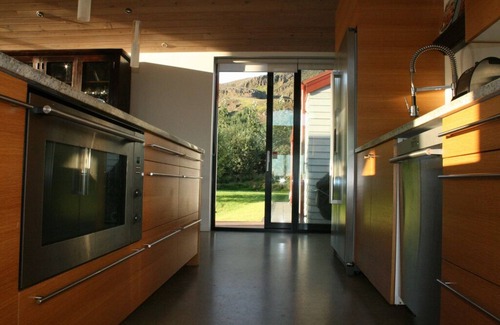 Hveragerdi House | Elegant Riverfront Villa with Hot Tub Near Golden Circle