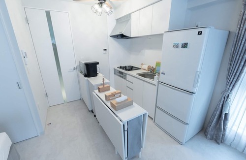 Chikusa Ward Apartment | Elegant Room Near Ikeshi in Japan - Family-Friendly Amenities