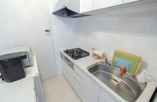 Chikusa Ward Apartment | Elegant Room Near Ikeshi in Japan - Family-Friendly Amenities