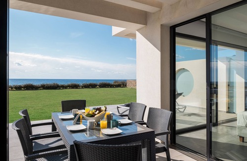 Chalikounas Villa | Seafront Villa Afroditi: Private Beach & Heated Pool Oasis