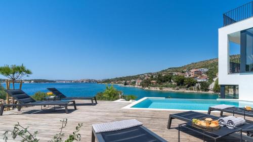 Rogoznica Villa | Seafront Villa Roots: Private Heated Pool & Ocean Views
