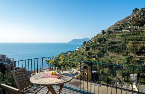 Manarola Apartment | Seaside Retreat: Manarola Oceanview Apartments by Arbaspàa