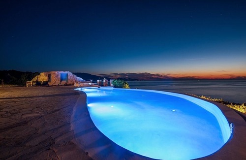Korithi Villa | Elegant Stone House with Infinity Pool and Ocean Access