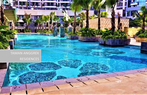 Jakarta Apartment | Modern Studio at Taman Anggrek with Pool & Child-Friendly Amenities