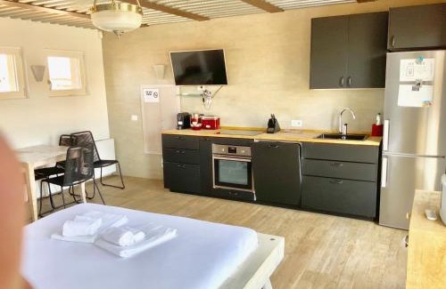 Ponte Seveso Apartment | Stylish Studio with Unique Views Near Main Station