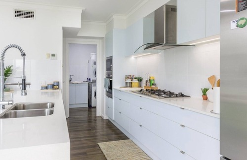 Moreton Bay Region House | Elegant Getaway with Pool Access by the Canal