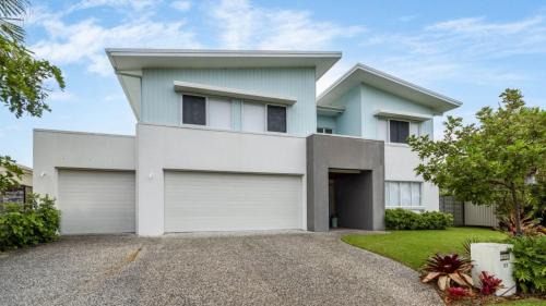 Moreton Bay Region House | Elegant Retreat on the Canal with Pool & Family Amenities
