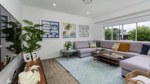 Moreton Bay Region House | Elegant Retreat on the Canal with Pool & Family Amenities