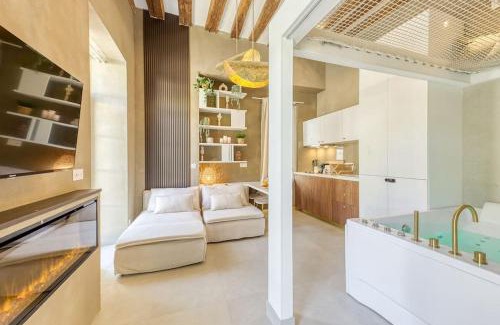 Arpajon Apartment | Indulgent Jacuzzi Suite with Sauna - 4 Star Rated Stay