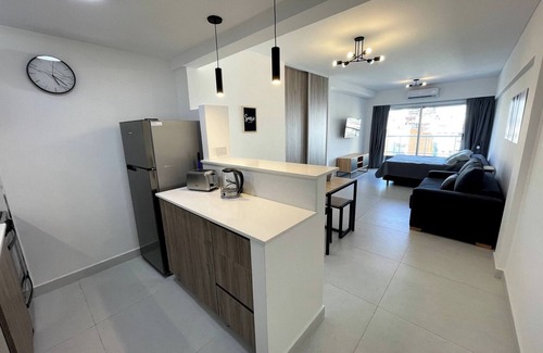 Caballito Apartment | Inviting Poolside Retreat in Caballito for Your Stay