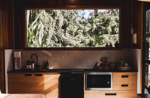 Cardiff Bed & Breakfast | Cozy Tiny Home with Outdoor Bath and Infrared Sauna