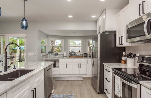 Tarpon Springs House | Tranquil Tropical Oasis with Heated Pool and Ocean Views