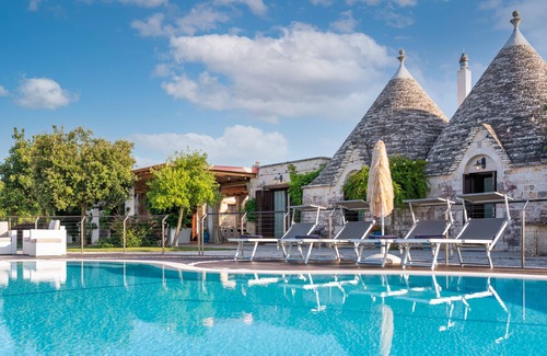 Castellana Grotte Villa | Elegant Trullo with Private Pool & Tennis Court Awaits