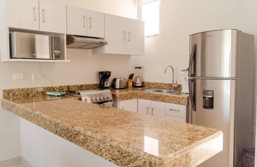 Progreso Municipality Apartment | Elegant Oceanfront Retreat with Pool and Spa Amenities