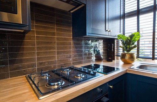 Leyton Apartment | Indulgent Versace 1 Bed Retreat with Hot Tub & Pool Table