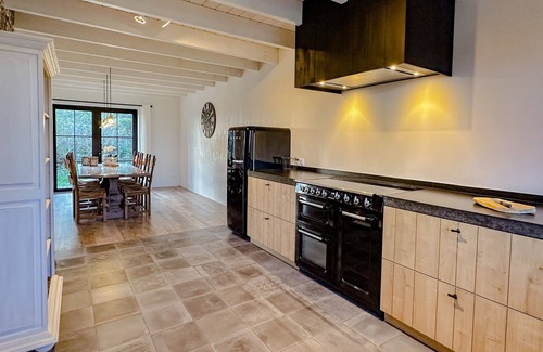 Nieuwvliet House | Elegant Villa Surrounded by Meadows with Breakfast Included