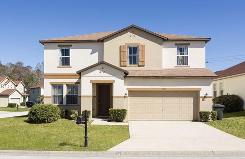 Windwood Bay House | Discover a Dream Villa Near Disney with Pool & Theater