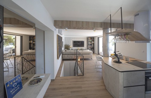 Cove Murtar Villa | Elegant Kallithea Villa: Heated Pool, Gym & Ocean View