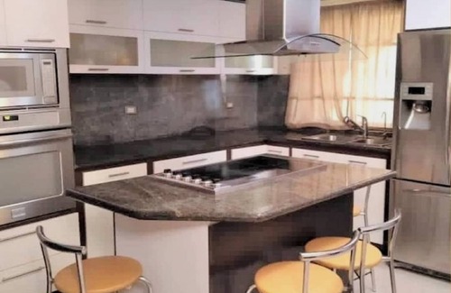 Lecherías Villa | Elegant Village Retreat with Pool & BBQ, 5 Min to Beach