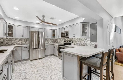 Hendricks and Venice Isles House | Elegant Waterfront Bungalow with Private Pool & Dock