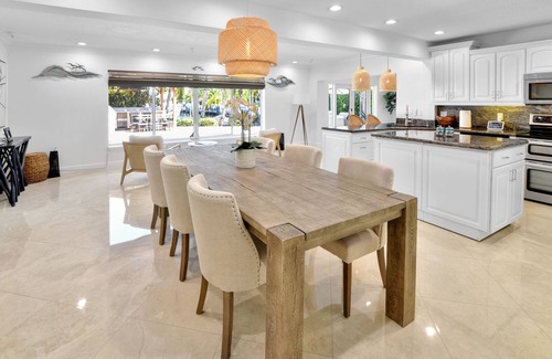 Garden Isles House | Waterfront Paradise Retreat with Heated Pool and Spa