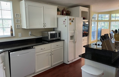 Weeki Wachee Gardens House | Waterfront King & Queen Suites with Kayaks and Ocean Views