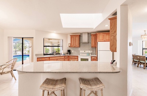 Punta Gorda Villa | Elegant Waterfront Villa with Heated Pool and Fishing Dock