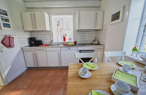 Norddorf House | Discover Family-Friendly Comfort at Lycka-Hues Hotel