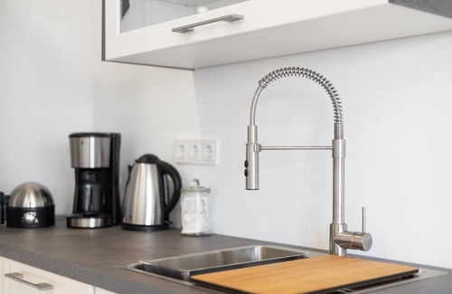 Hornum Apartment | Discover Lykke: Modern Scandinavian Retreat with Balcony