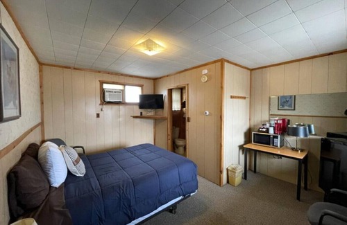 Onaway Cabin | Cozy Lyons in Onaway - Queen Bed Room for Two Guests