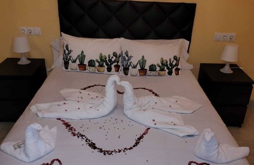 El Ejido Apartment | Family-Friendly Retreat at Lyrioshomes Los Tréboles