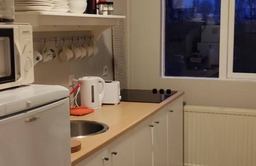 Hvalfjarðarsveit House | Discover Móar Guesthouse: Family-Friendly with Kitchen Access