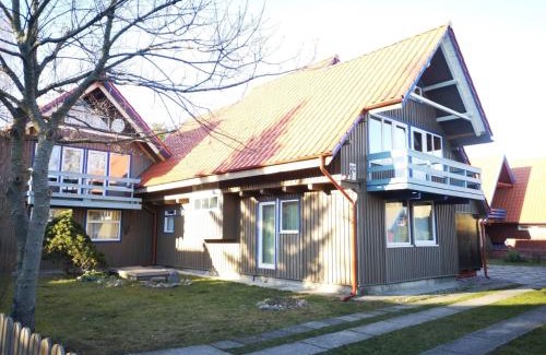 Neringa House | Family-Friendly Retreat at Mūsų kiemas with Kitchen Access