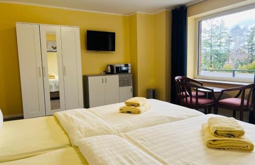 Neu Wulmstorf Hotel | Comfortable M&M Hotel - Neu Wulmstorf with Hot Tub & Breakfast