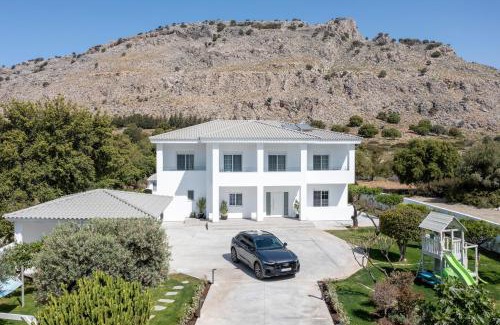 Pefkos Villa | Discover M Mansion: Oceanfront Getaway with 9.9 Review Score