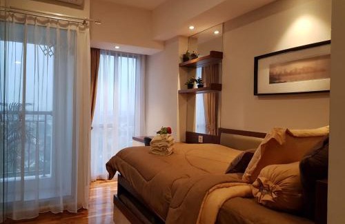 Tangerang Apartment | Comfortable M-Town Residence with Pool & Breakfast Included