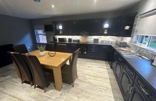 Clogher House | Top-Rated Mac's Cottage: Pet-Friendly with Hot Tub Access